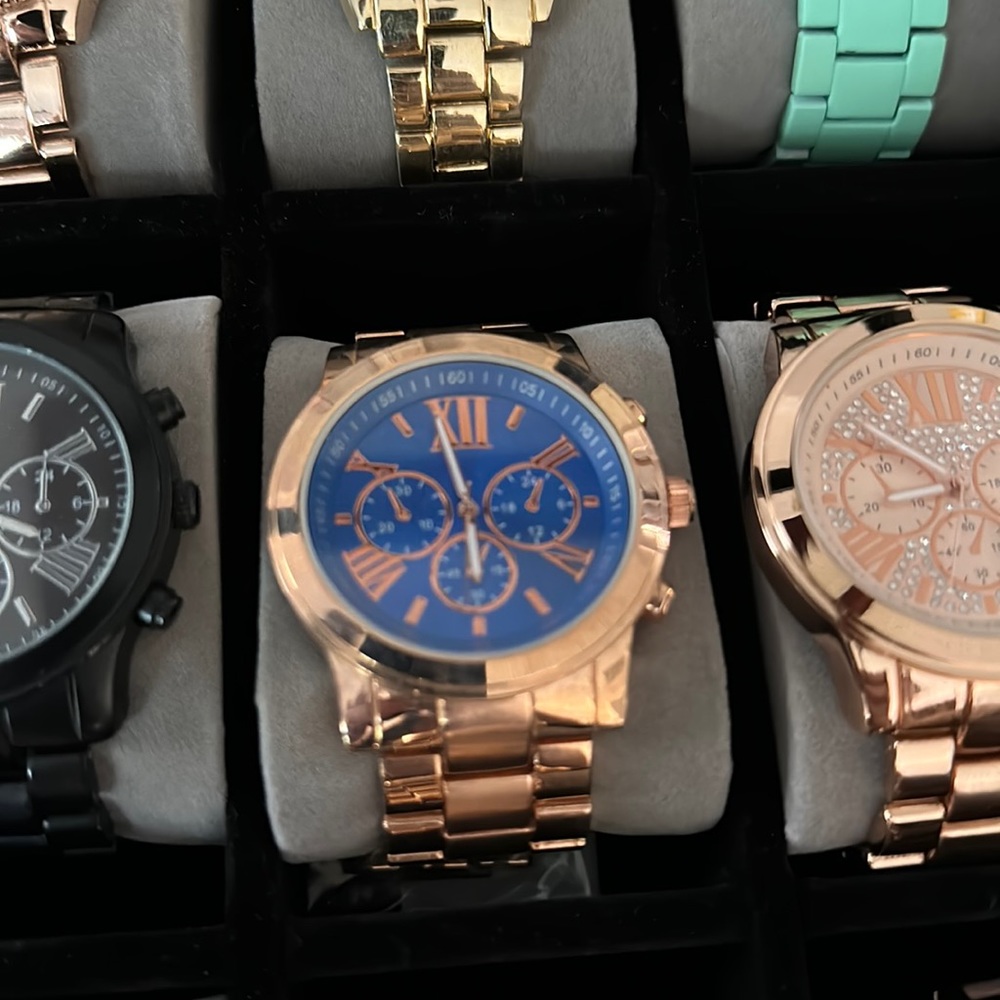 Rose gold watch with blue background